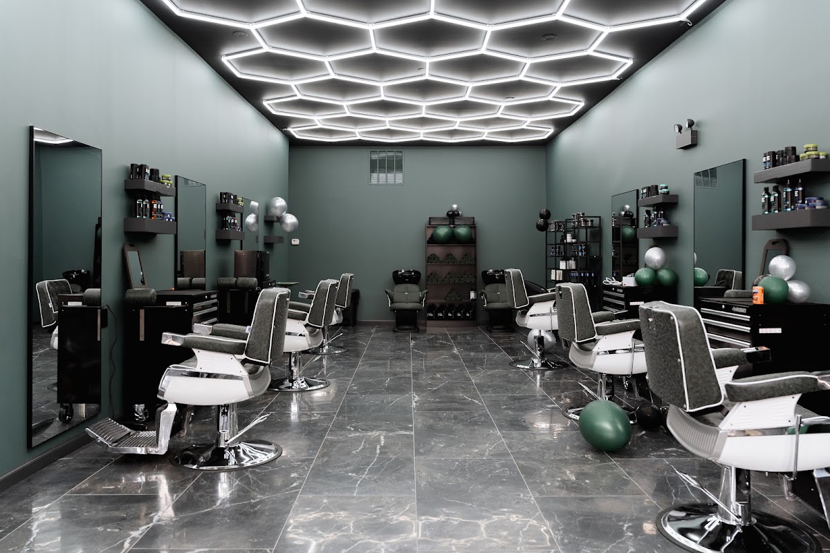 Barbers at work inside Boss Fade Chicago on Lawrence Avenue