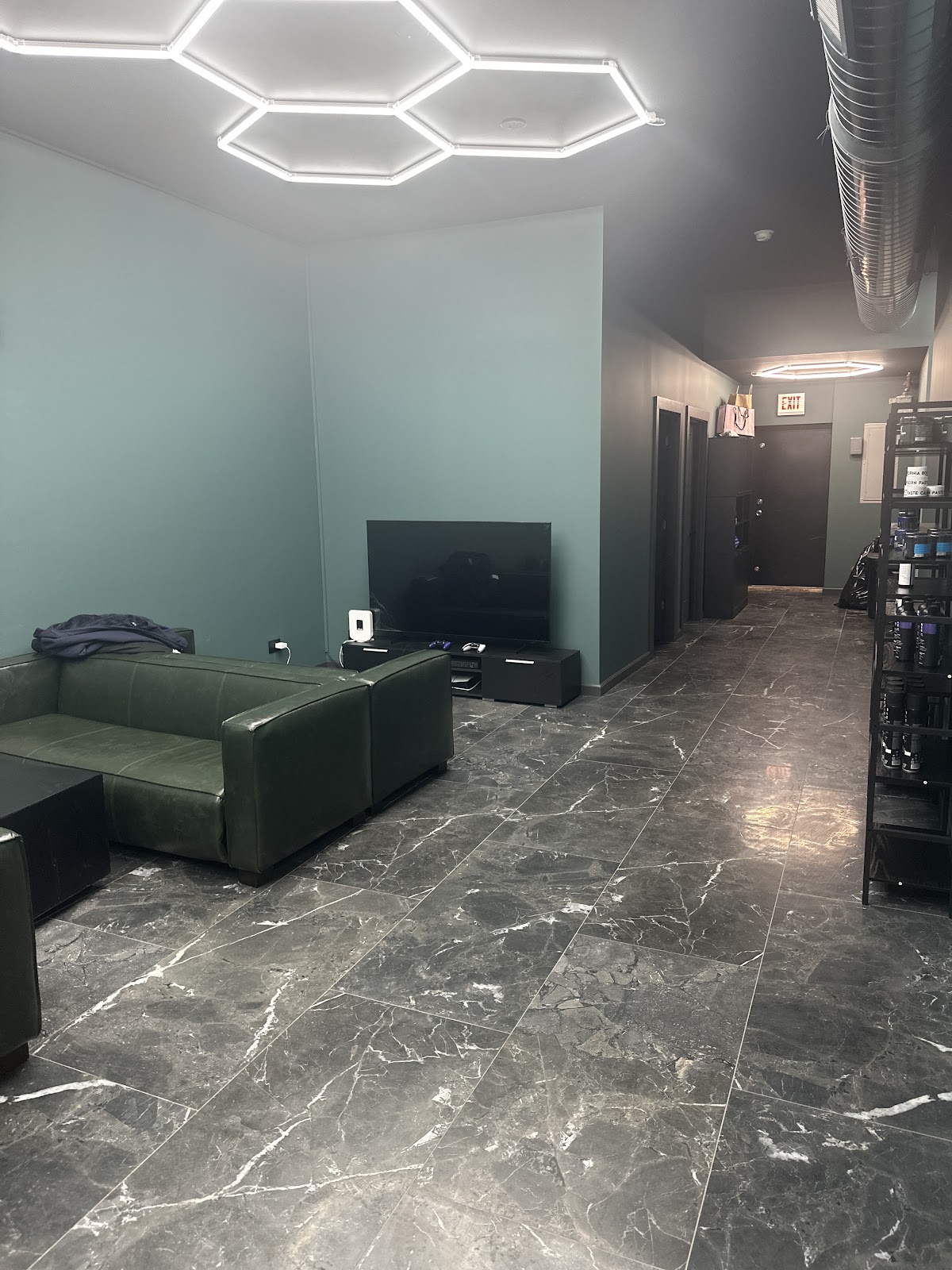 Barber station and chairs inside Boss Fade Chicago
